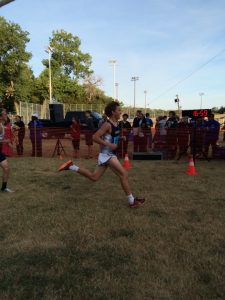 Miles Burrow finishes the race.