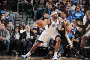 Trey Burke guarding Vince Carter