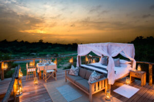 Beautiful African Sunset with nice looking outside bed. Copyright: DOOKPHOTO