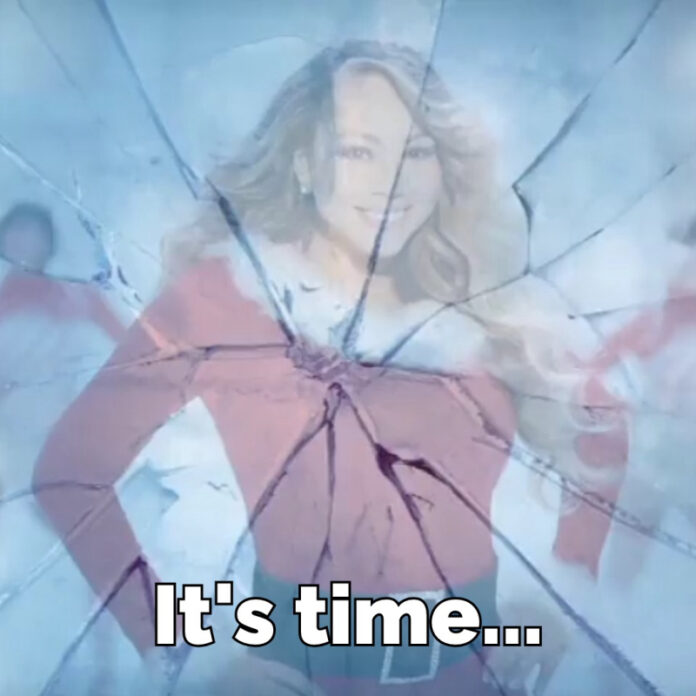 photo of Mariah Carey bursting out of an ice block