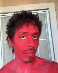 photo of a guy with red skin
